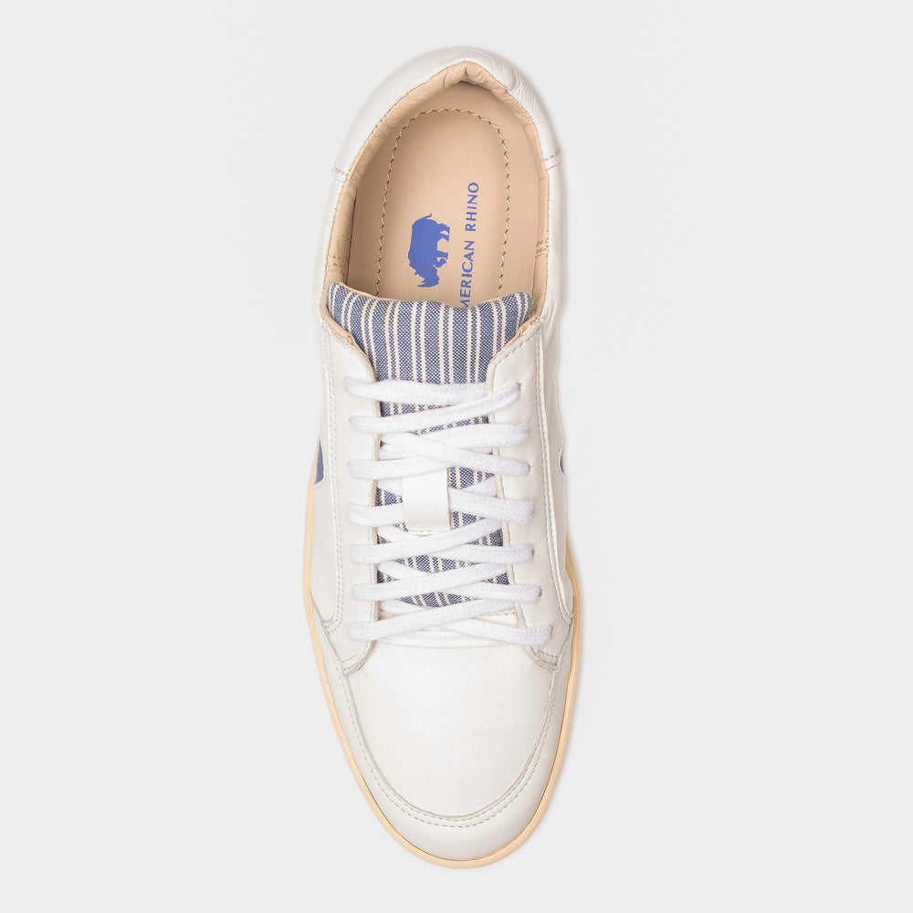 
                  
                    White Leather Blue Horn Nomad Classic Unisex Sneakers
                  
                